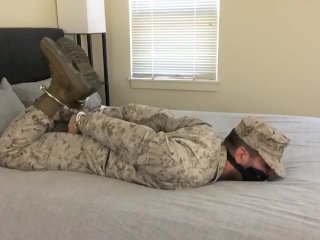 View Cuffed and Gagged Marine Hogtied in Uniform