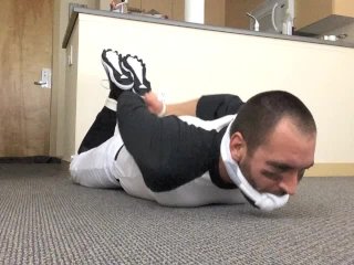 View Sockgagged Baseball Player Tied up and Jerking Off