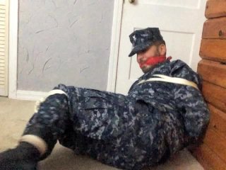 View Sailor Ties Himself up