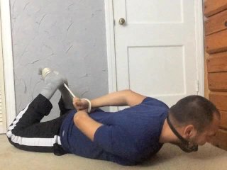 View Hogtied and Bitgagged Athlete