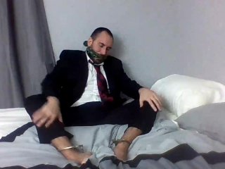 View Gagged and Showing off in a Suit